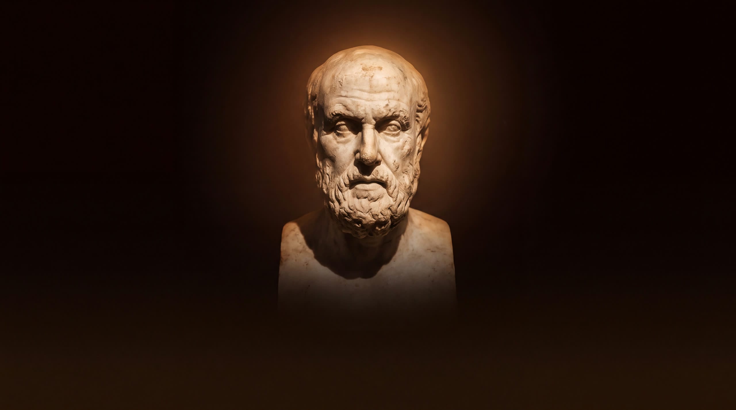 Busto de mármore de Hipócrates emergindo da sombra